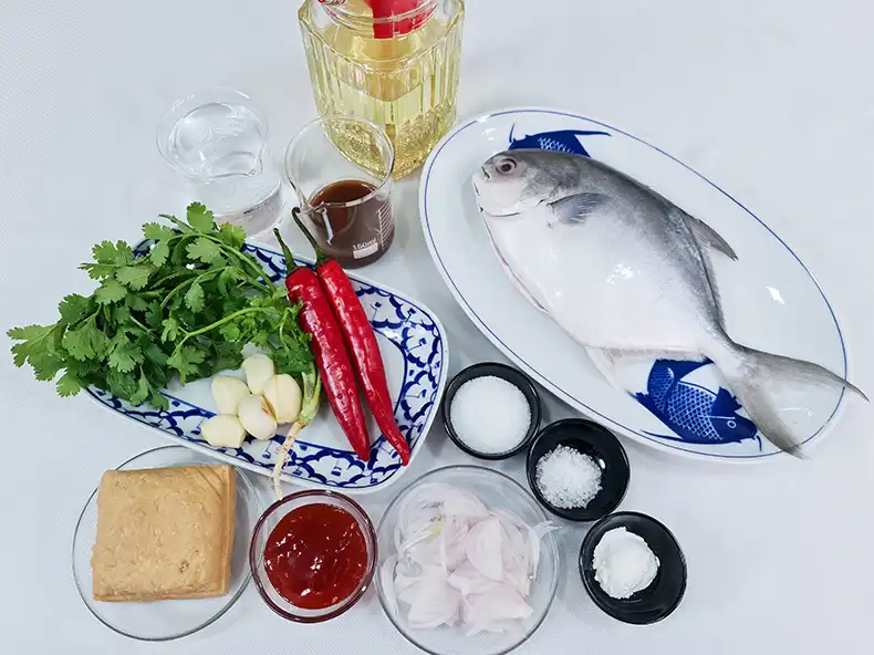 ingredients All the ingredients needed: fish, tapioca flour, water, cooking oil, cilantro, red chilli, garlic, red onion, tamarind juice, salt, sugar, crispy flour, chilli sauce and tofu.